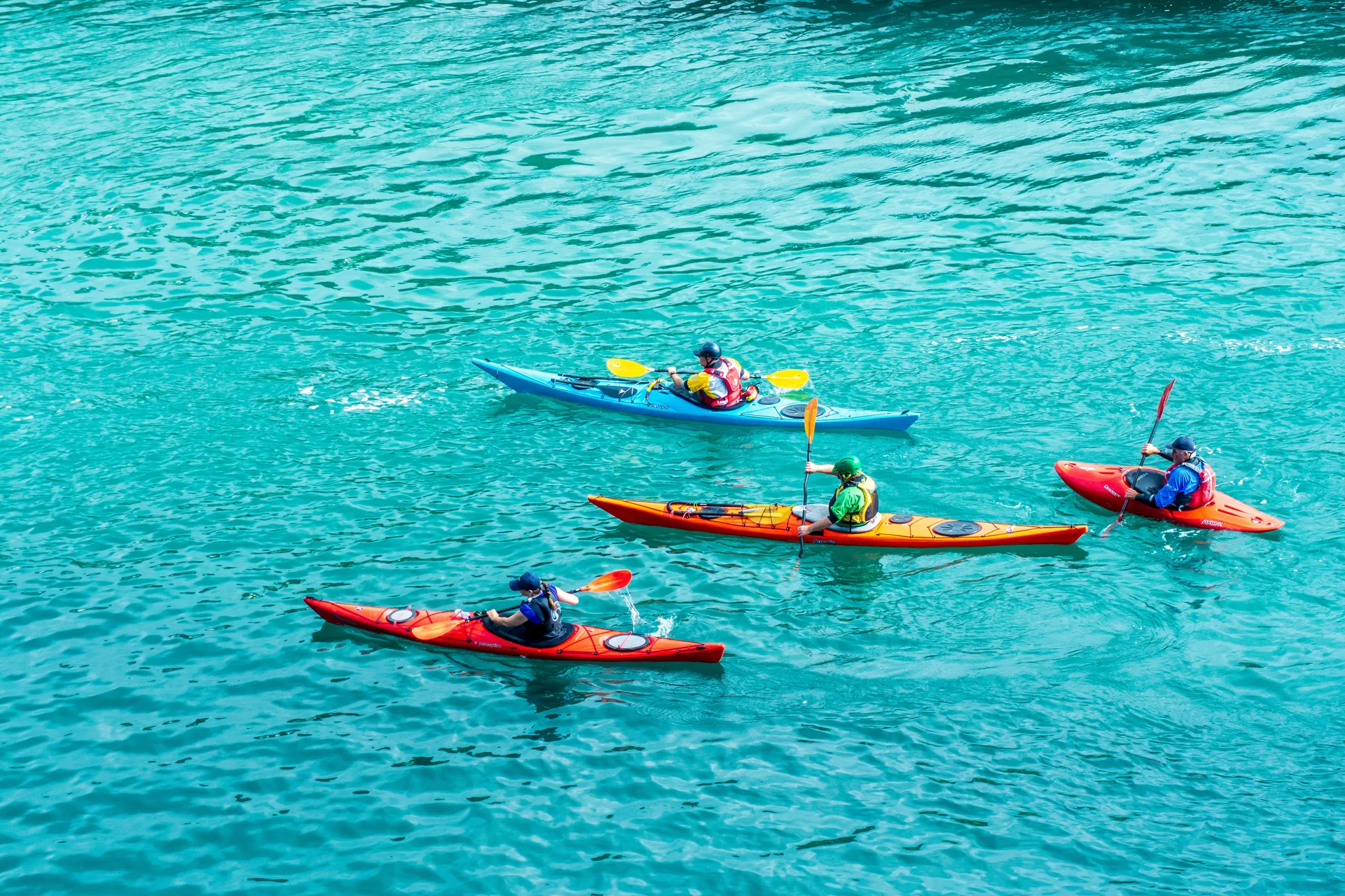 Paddlers connecting on the water